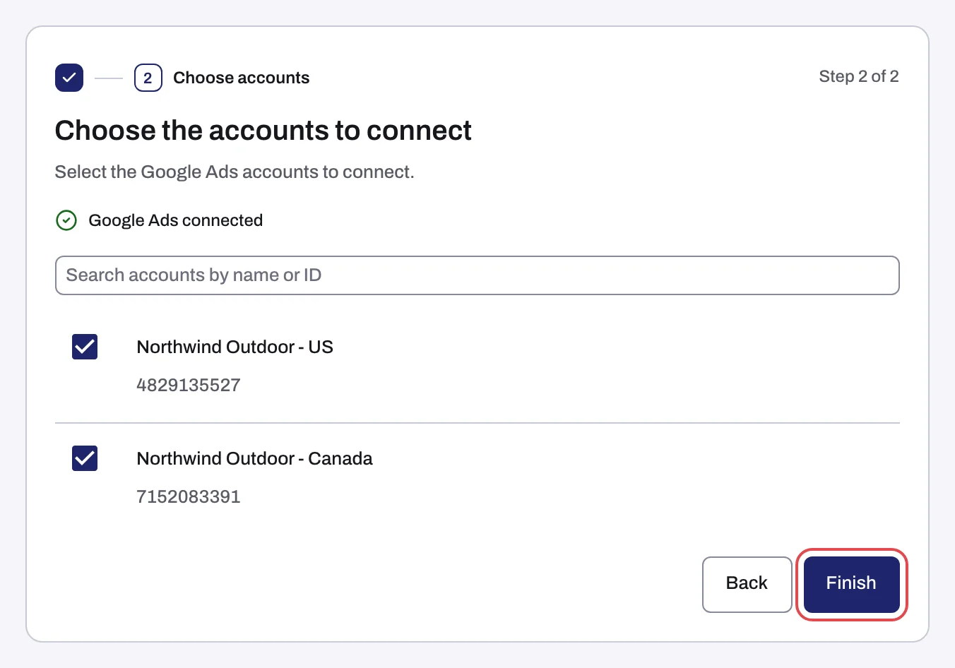 Choose the accounts to connect, with two Google Ads accounts ticked and the Finish button