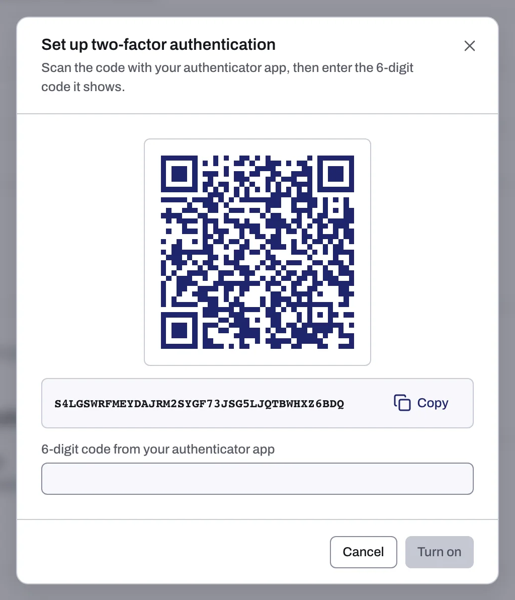 The Set up two-factor authentication dialog with the QR code, the secret key and the code field
